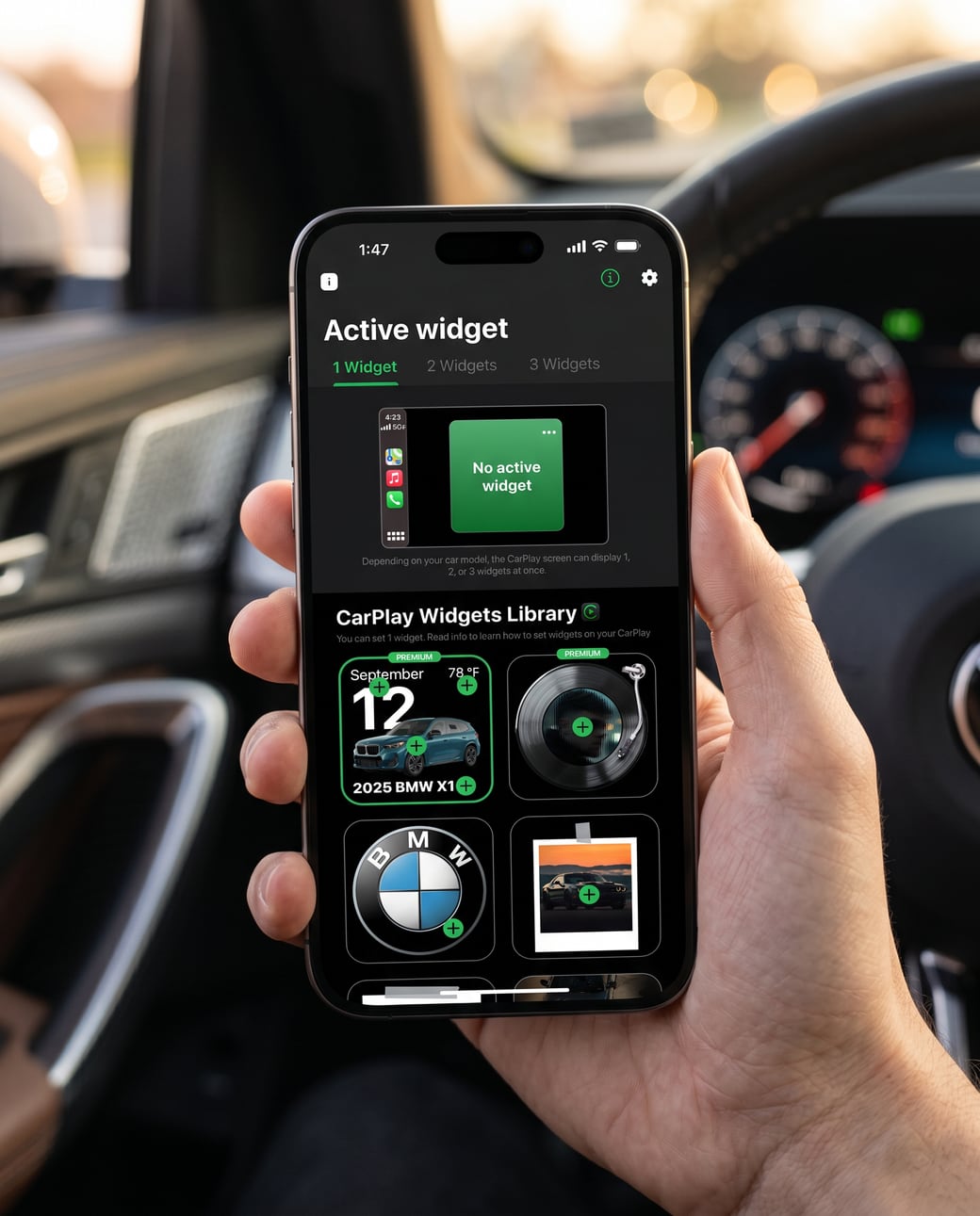 A hand holding an iPhone with the CarTheme app open